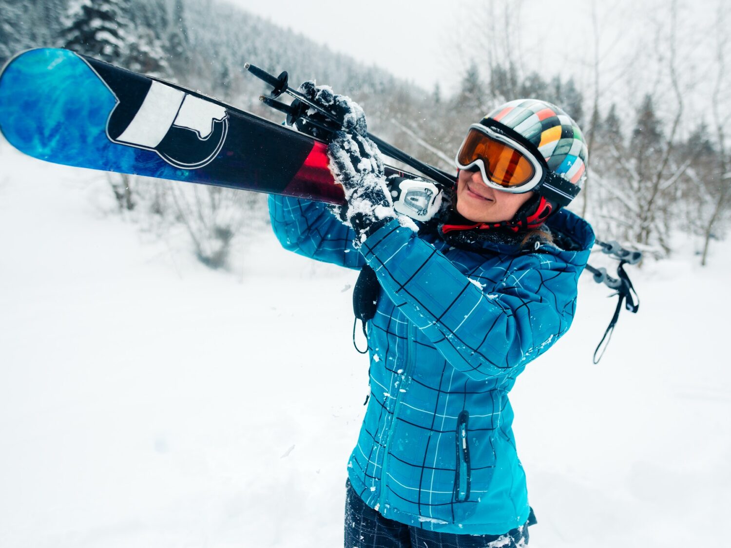 girl go with ski equpment in ski touring